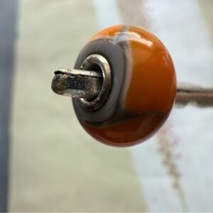 Authentic Trollbeads – Retired “Orange Armadillo” Glass Bead (LAA Hallmark)